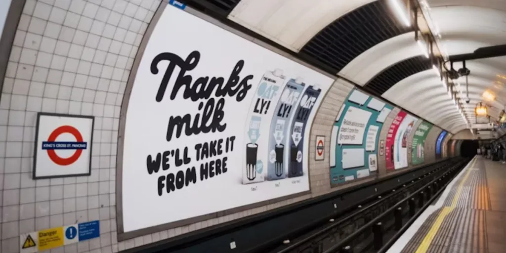 Creative anti-marketing billboard by Oatly in London subway, showing bold text and minimal design, inspiring digital marketing Gold Coast strategies.
