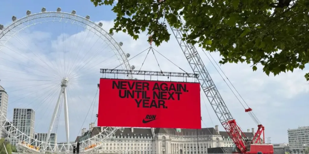 Nike uses anti-marketing with ironic billboard message near London Eye, a campaign approach relevant to digital marketing Gold Coast insights.